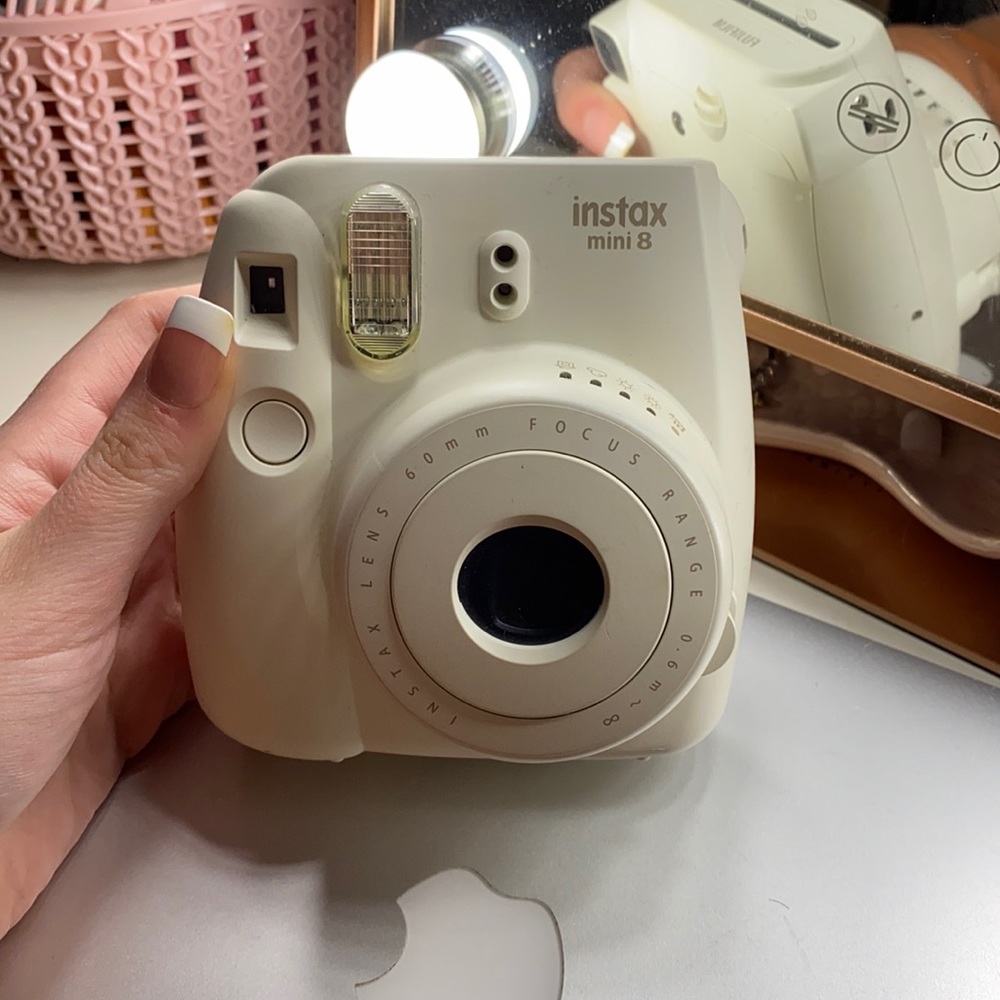 White Instax Mini 8 polaroid camera